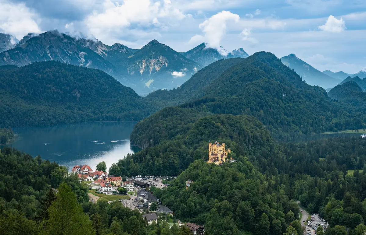 Hohenschwangau Castle above the Alpsee with the Tannheim mountains