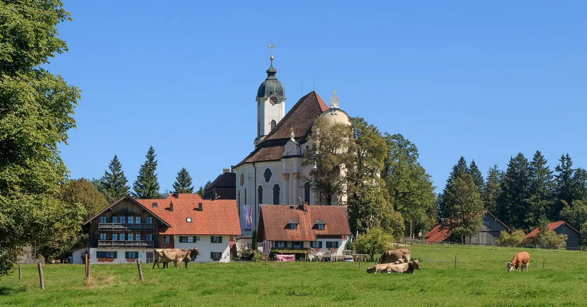 The Wieskirche pilgrimage church in its meadows